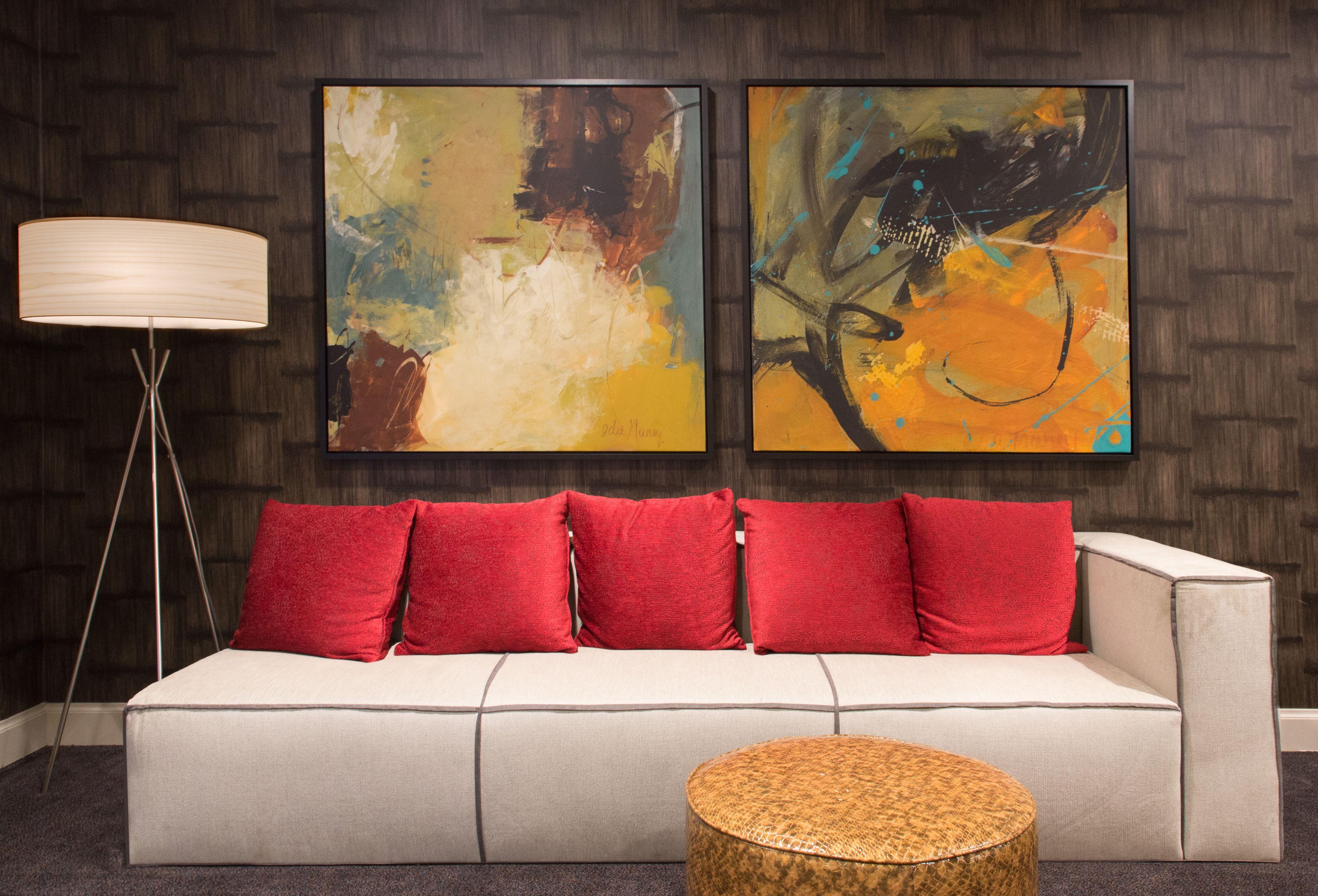 Image of sofa with abstract artwork at The Union Station Nashville Yards, a member of Historic Hotels of America since 2015, located in Nashville, Tennessee